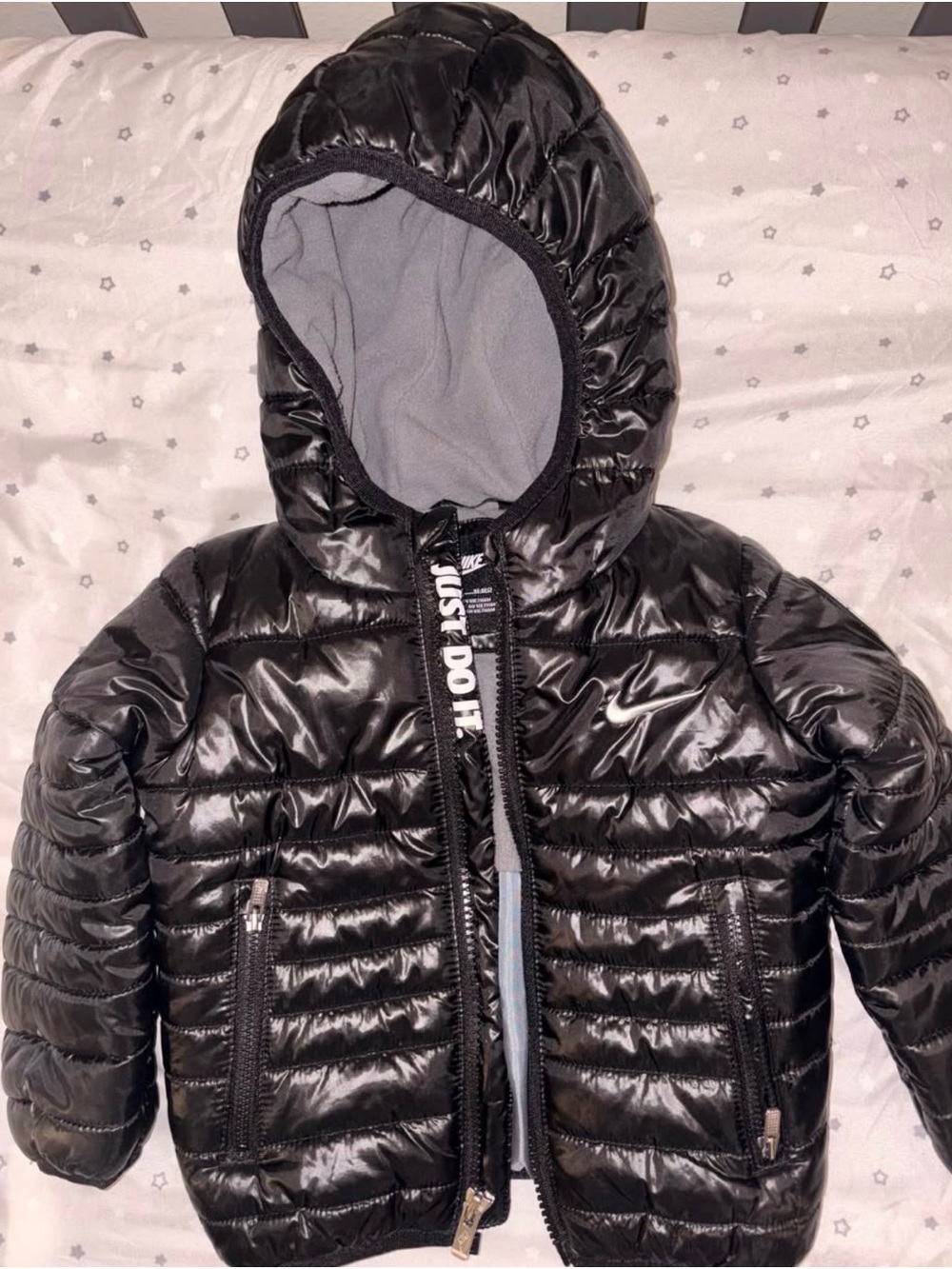 Black Puffer Hooded Jacket with 'Just Do It' Trim